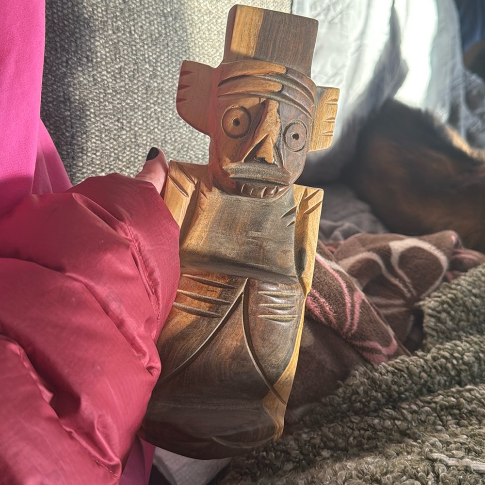 Handcrafted wooden statue for protection